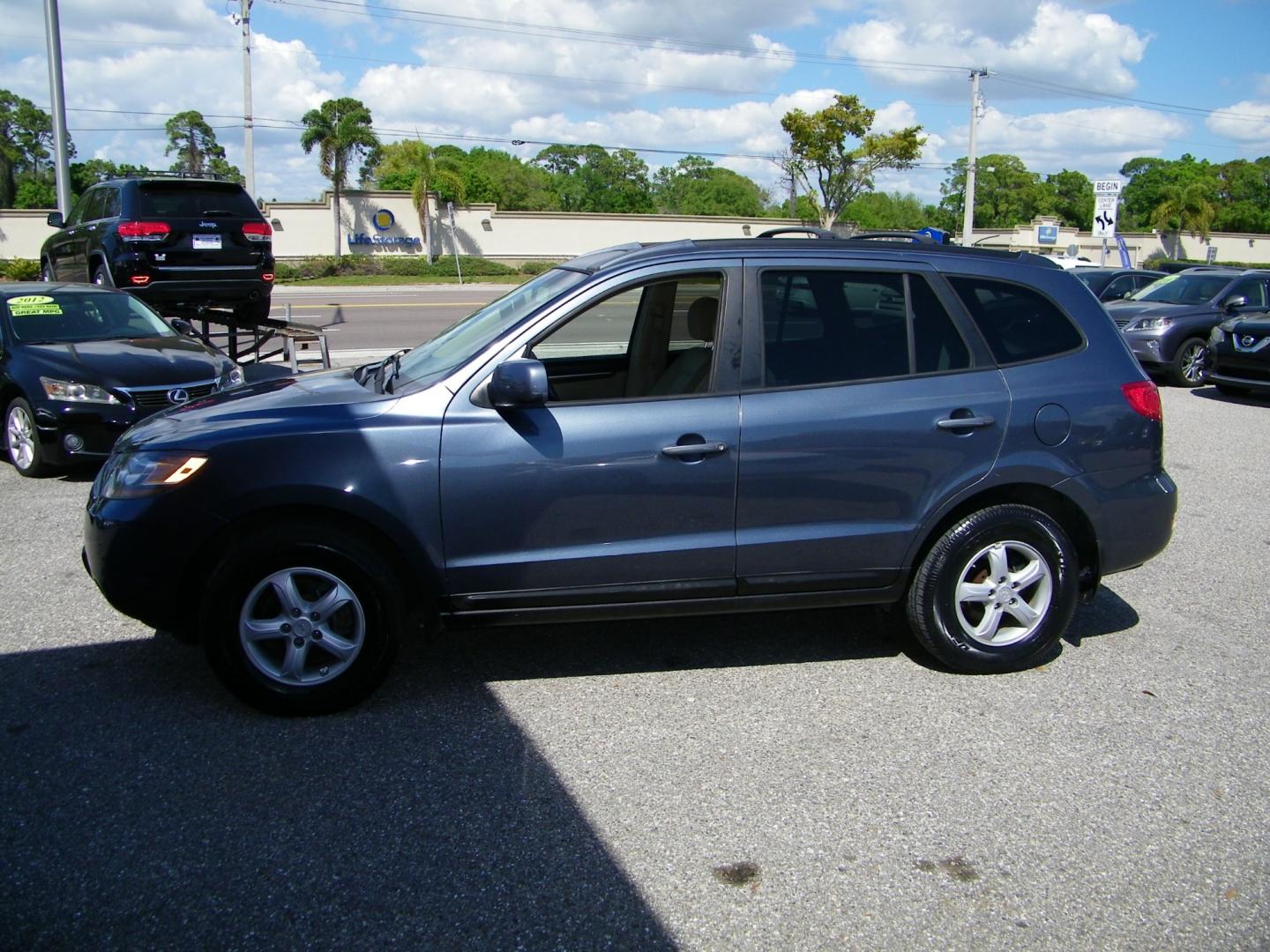 2007 Gray /Gray Hyundai Santa Fe GLS (5NMSG13D57H) with an 2.7L V6 DOHC 24V engine, Automatic transmission, located at 4000 Bee Ridge Road, Sarasota, FL, 34233, (941) 926-0300, 27.298664, -82.489151 - Photo#2